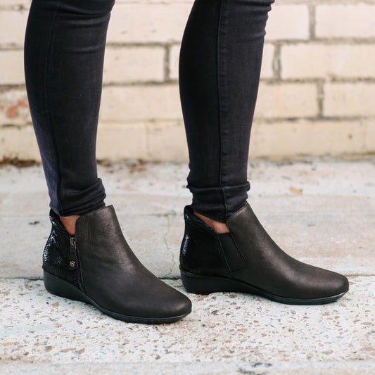 Lifestyle image for Damascus Wedged Boot - Onyx/Black Lizard